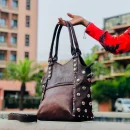Shoulder Studded leather handbag
