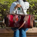 Antique Moroccan carpet leather travel bag
