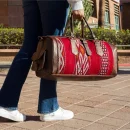 Antique Moroccan carpet leather travel bag