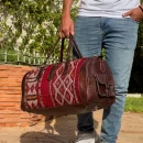 Antique Moroccan carpet leather travel bag