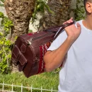 Antique Moroccan carpet leather travel bag