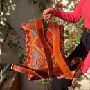 Brown Roll Top Leather Backpack With Red & Orange Kilim