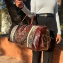 Morrocan Leather Travel Bag with Brown Carpet